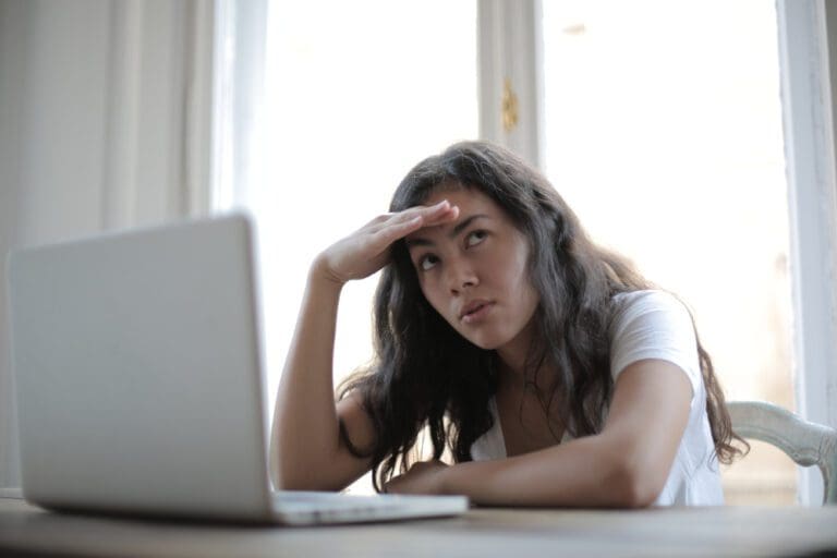 stressed woman at laptop